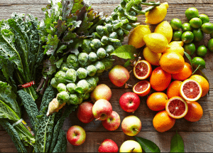 a group of fruits and vegetables on a wood surface Healthy Weight Loss Diets Crewe