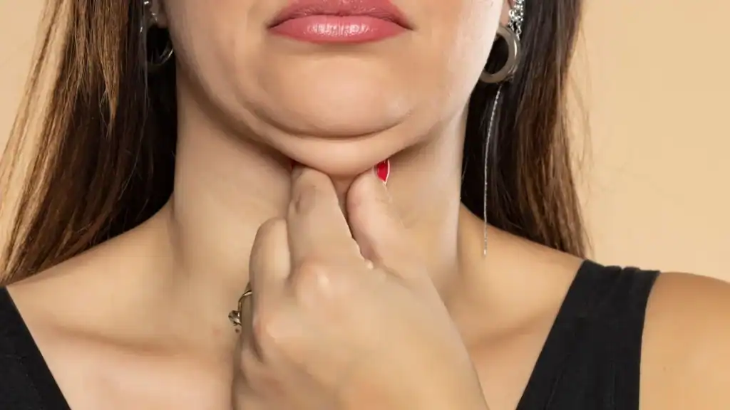 An image of a woman with double chin, sad, worried : Non Surgical Double Chin Removal Treatment in Crewe, UK